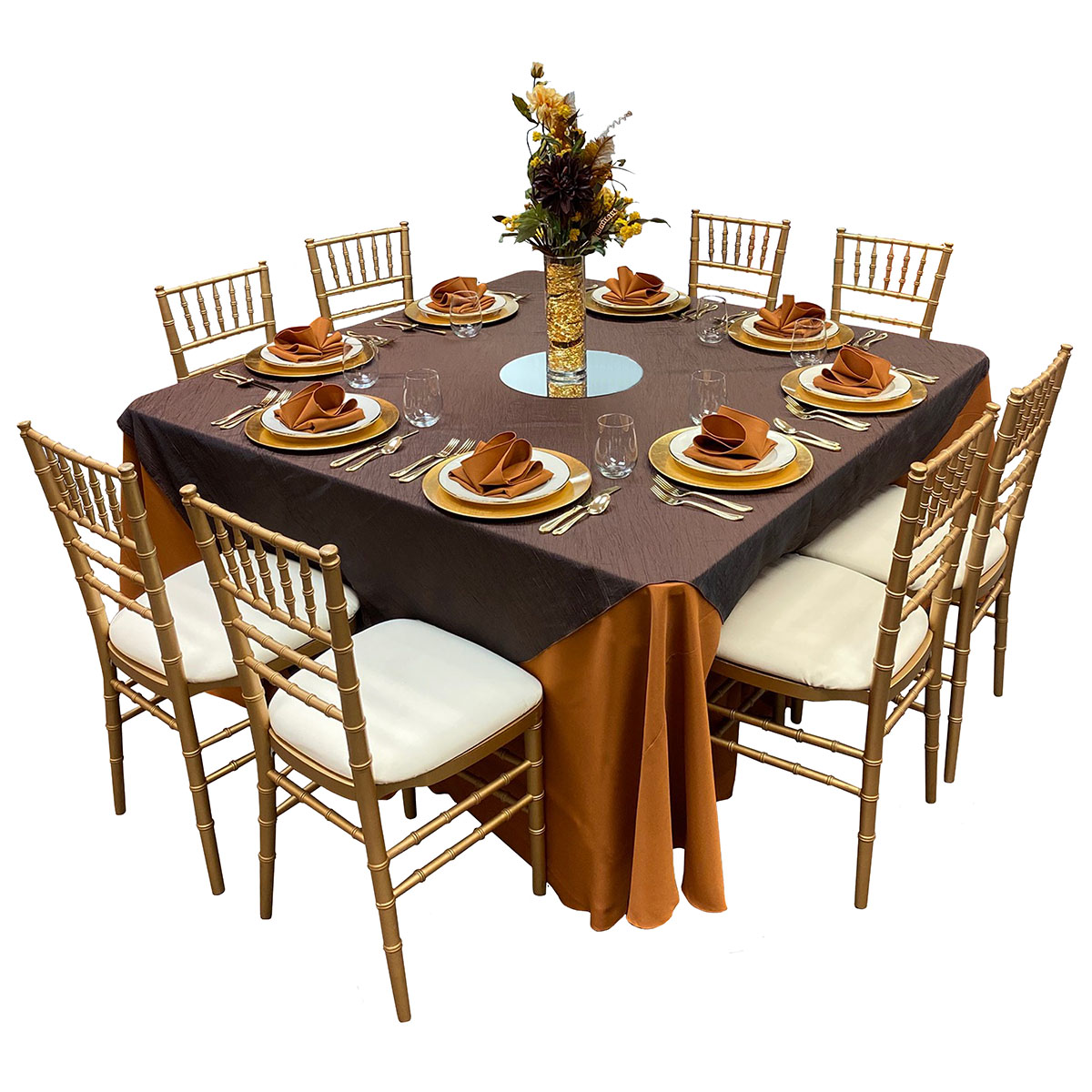 Table 60x60 Wood Topped With 120" Round Copper Solid Tablecover, 81x81 Krinkle Brown Topper, Brushed Gold Chargers, Beige With Gold Band China, Gold Plated Flatware, Stemless Wine White 17oz Glasses, Copper Solid Napkins, 4x12 Cylinder Vase, 14" Round Mirror (Flowers Not Included)