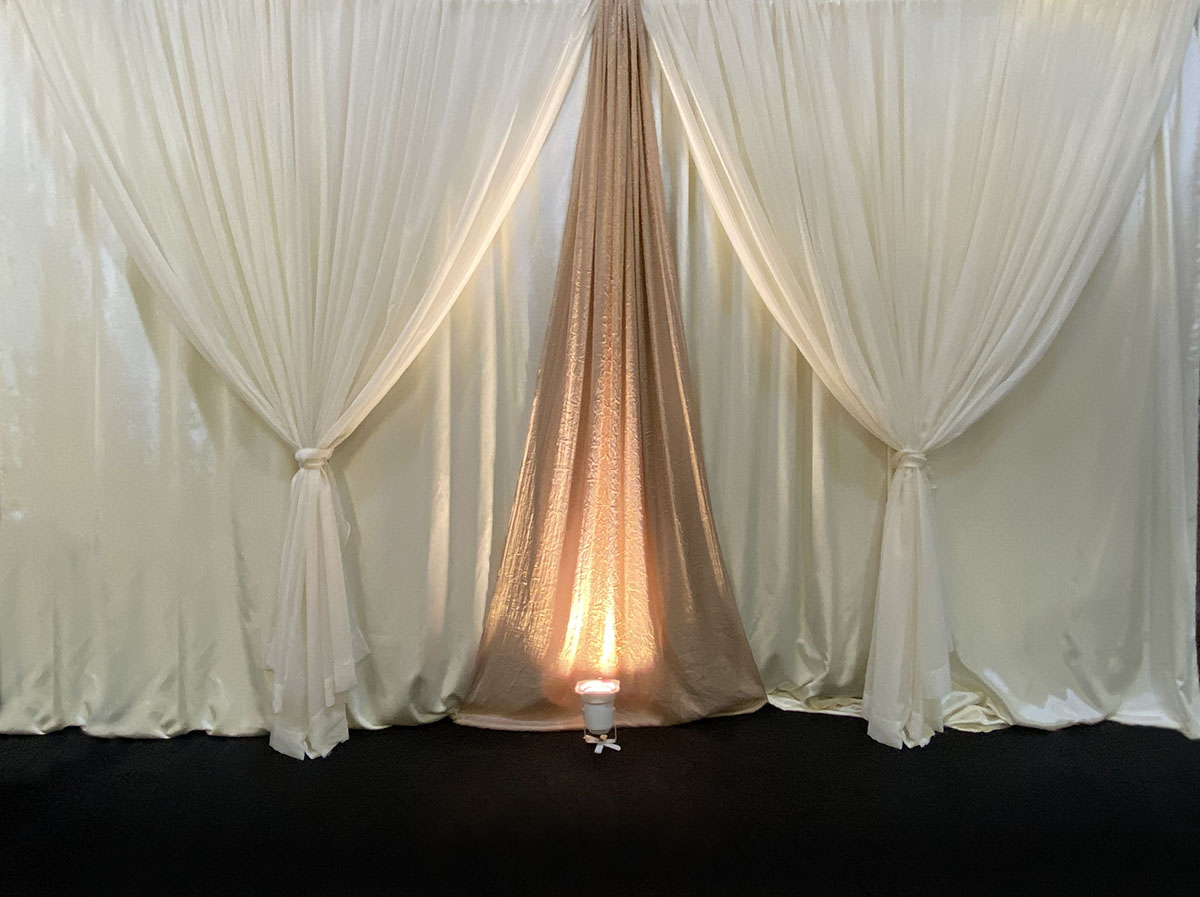 Ivory Bengaline Dual Panel Backdrop With Sheer Ivory Front Layer With Iridescent Crush Camel Accents With Uplights