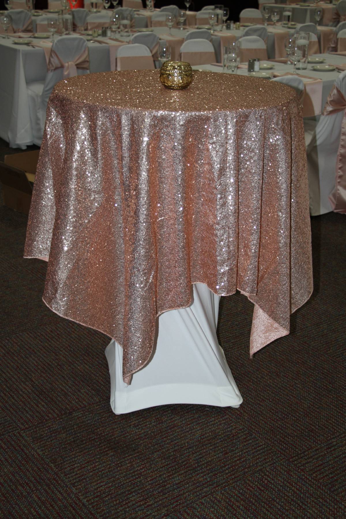 84x84 Blush Omni Sequin Overlay On White Spandex Table Cover On A 30" Round Cocktail Table